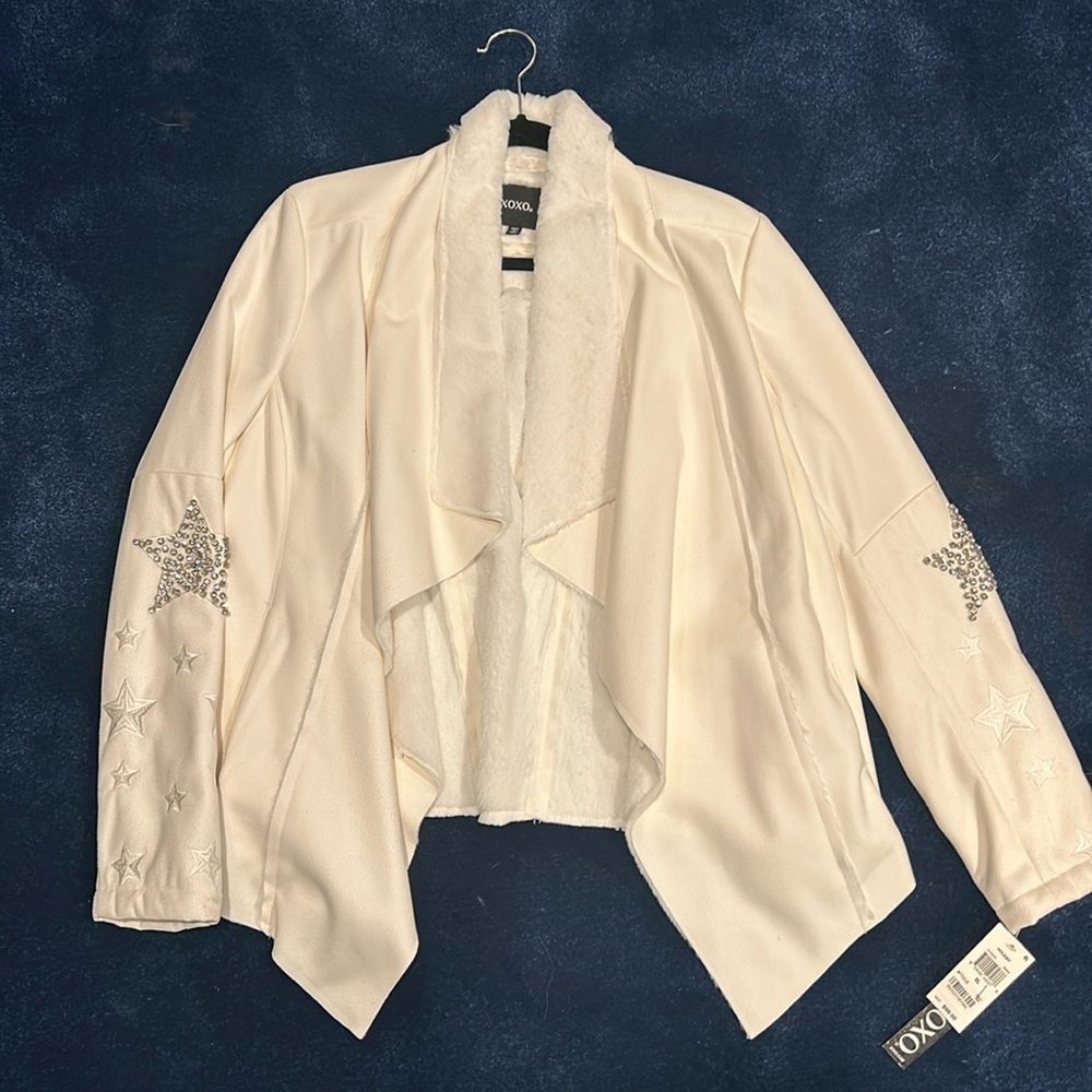Ladies, extra large, white faux Schierling jacket with stars on the sleeves.